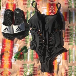 Black swimsuit with cut outs